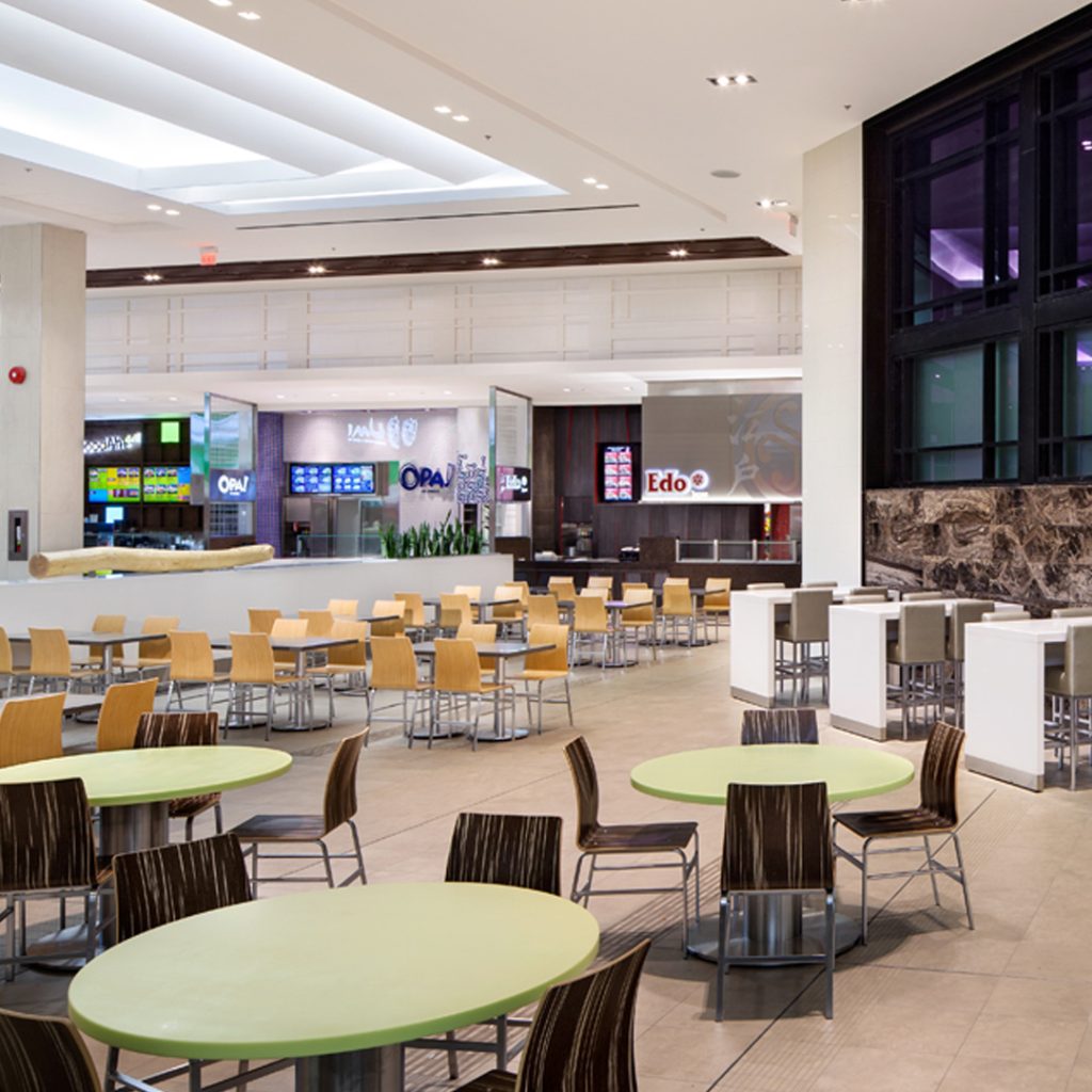 Location: Richmond BCDesigner: GHA DesignChair(s): Custom Wembley with specialty veneers  Barstool(s): 1116 Prizm Barstool  Table Base(s): 4100 Disc 9300 Oakley Table Top(s) : Corian built to specification